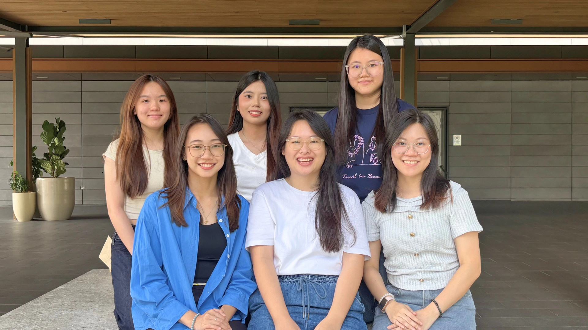 Plixitt team members dressed casually at work